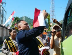 Bagikan 300 Bendera Merah Putih, Polda Papua Ajak Masyarakat Semarakkan HUT RI  ke-81